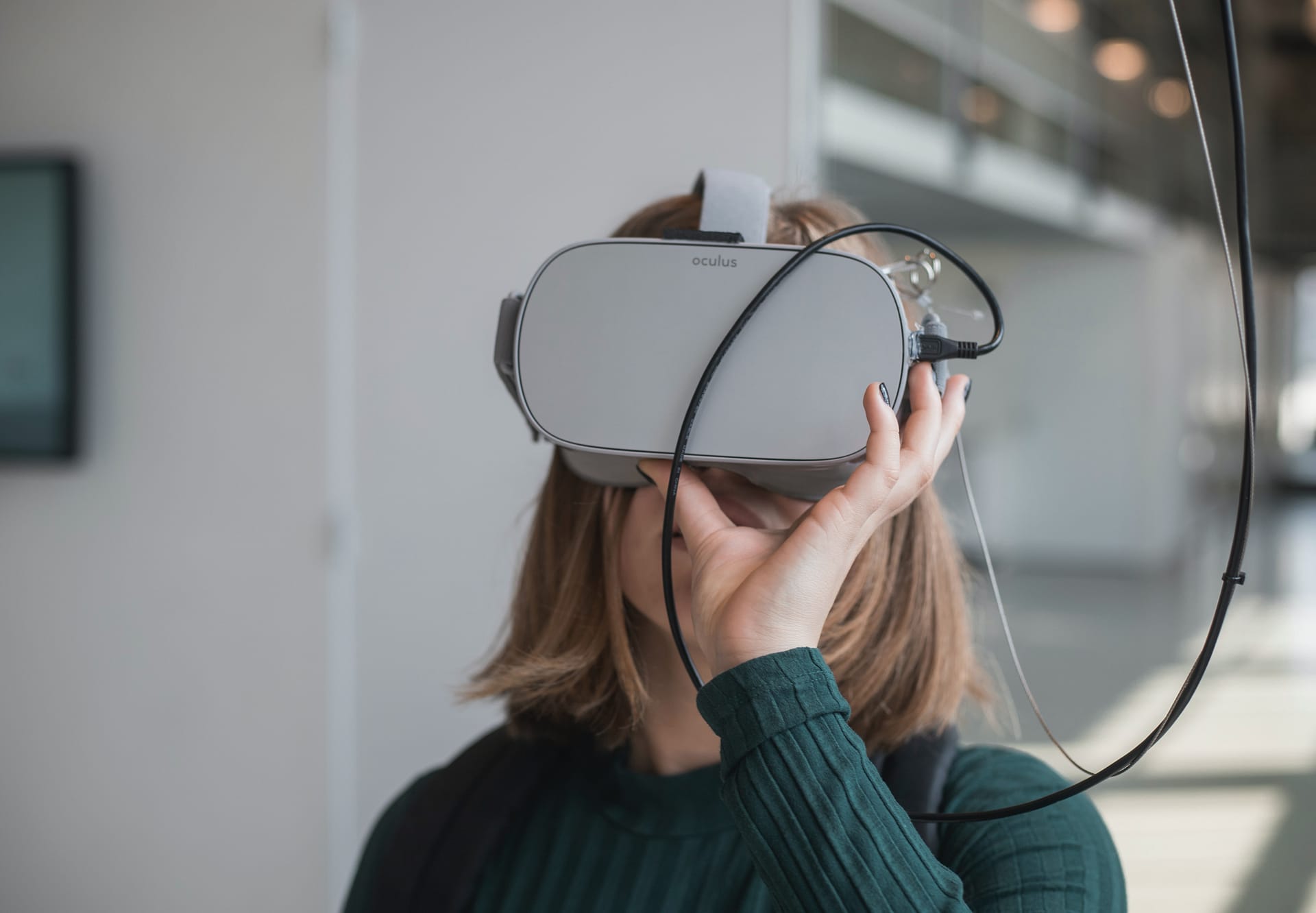 VR in schools - girl trying VR headset.